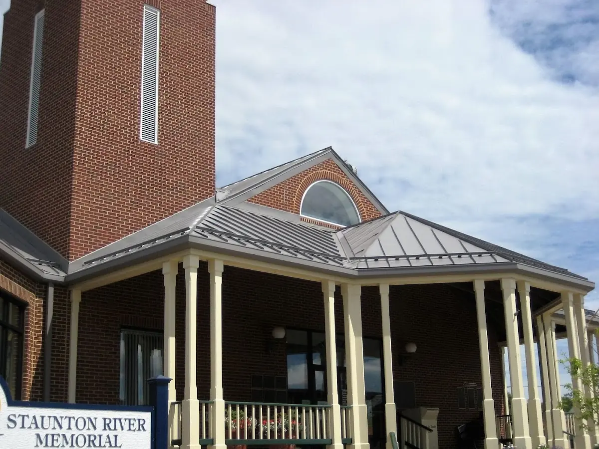 Skilled roofing craftsmen working on a residential roof in Oak Hill
